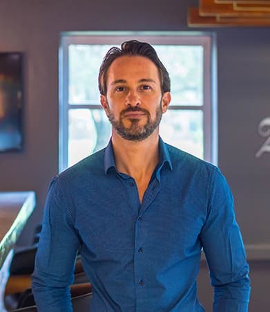 Man in blue button shirt